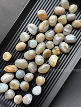 NaturalBotswana Agate tumbled crystals by Braun Homes √ê polished healing stones for meditation, Reiki, chakra balancing, anxiety relief, and spiritual energy protection in deep purple hues