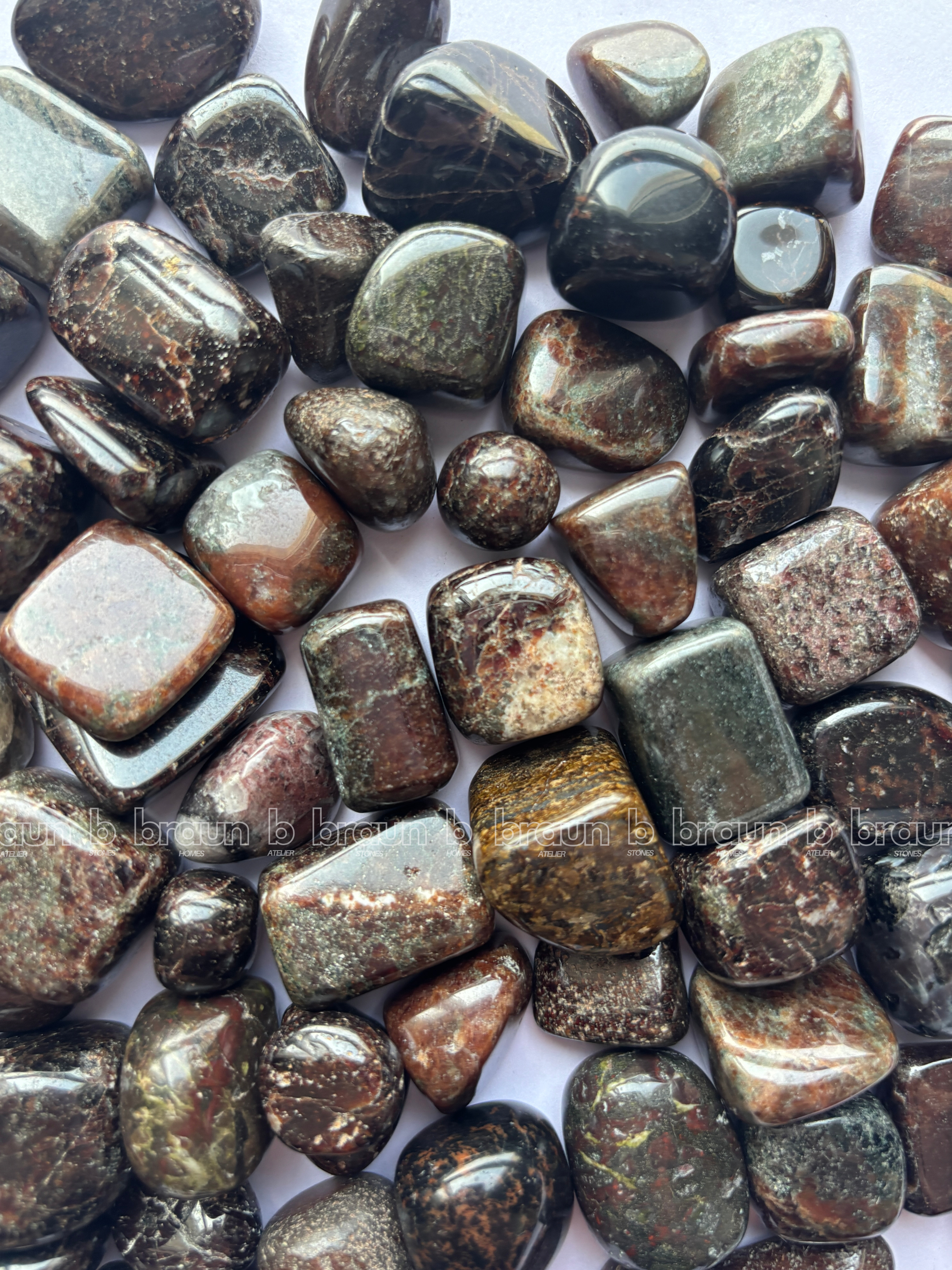 NaturalGarnet tumbled crystals by Braun Homes √ê polished healing stones for meditation, Reiki, chakra balancing, anxiety relief, and spiritual energy protection in deep purple hues