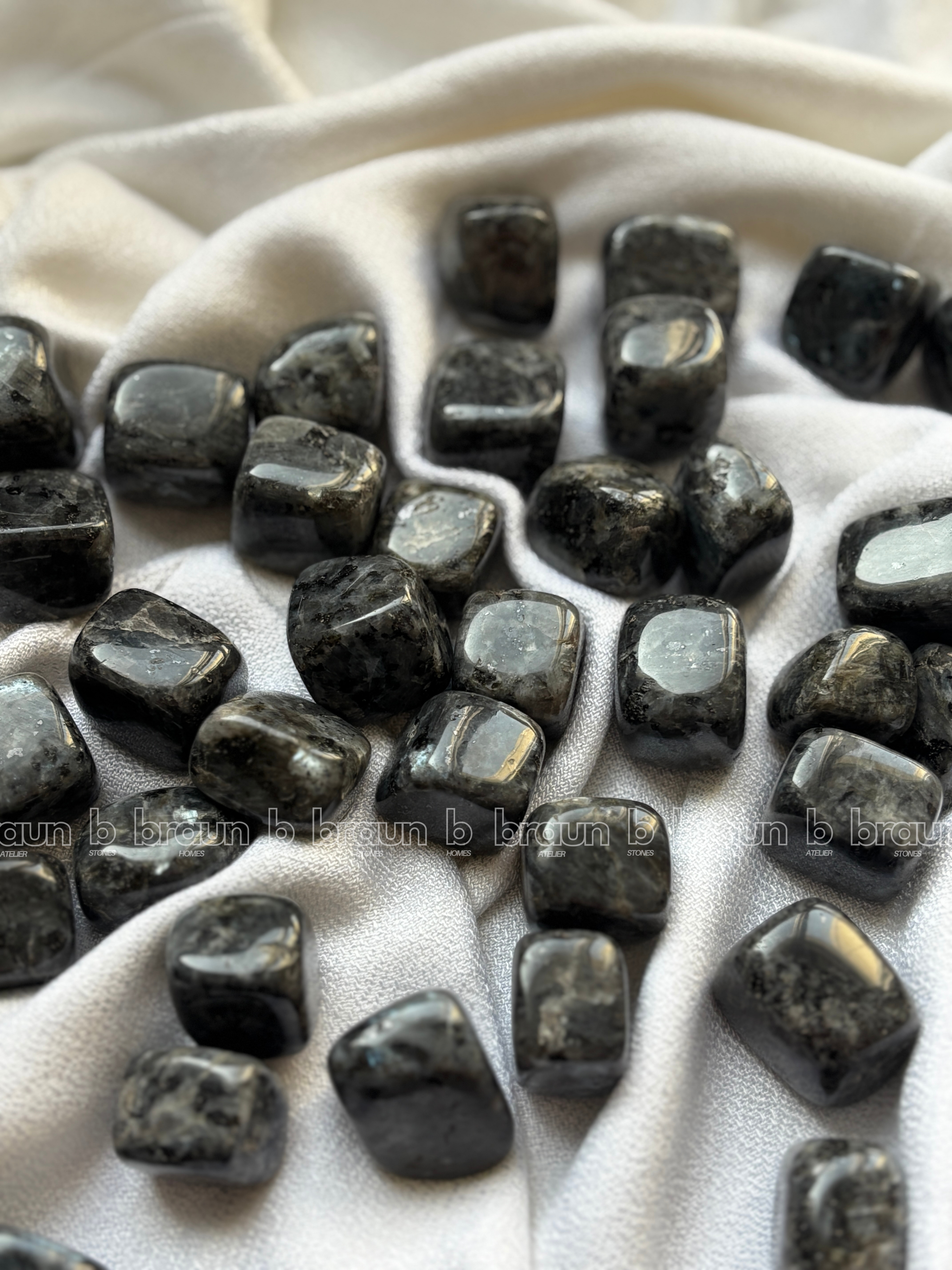 NaturalLarvakite tumbled crystals by Braun Homes √ê polished healing stones for meditation, Reiki, chakra balancing, anxiety relief, and spiritual energy protection in deep purple hues