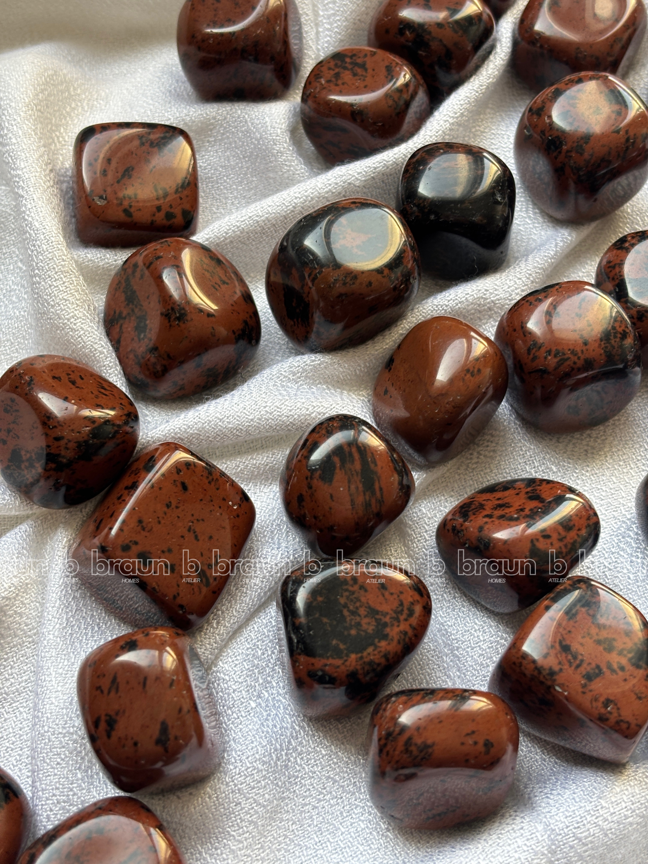 NaturalMahogany Obsidian tumbled crystals by Braun Homes √ê polished healing stones for meditation, Reiki, chakra balancing, anxiety relief, and spiritual energy protection in deep purple hues
