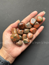 NaturalUnakite tumbled crystals by Braun Homes √ê polished healing stones for meditation, Reiki, chakra balancing, anxiety relief, and spiritual energy protection in deep purple hues