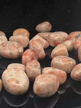 NaturalSunstone tumbled crystals by Braun Homes √ê polished healing stones for meditation, Reiki, chakra balancing, anxiety relief, and spiritual energy protection in deep purple hues